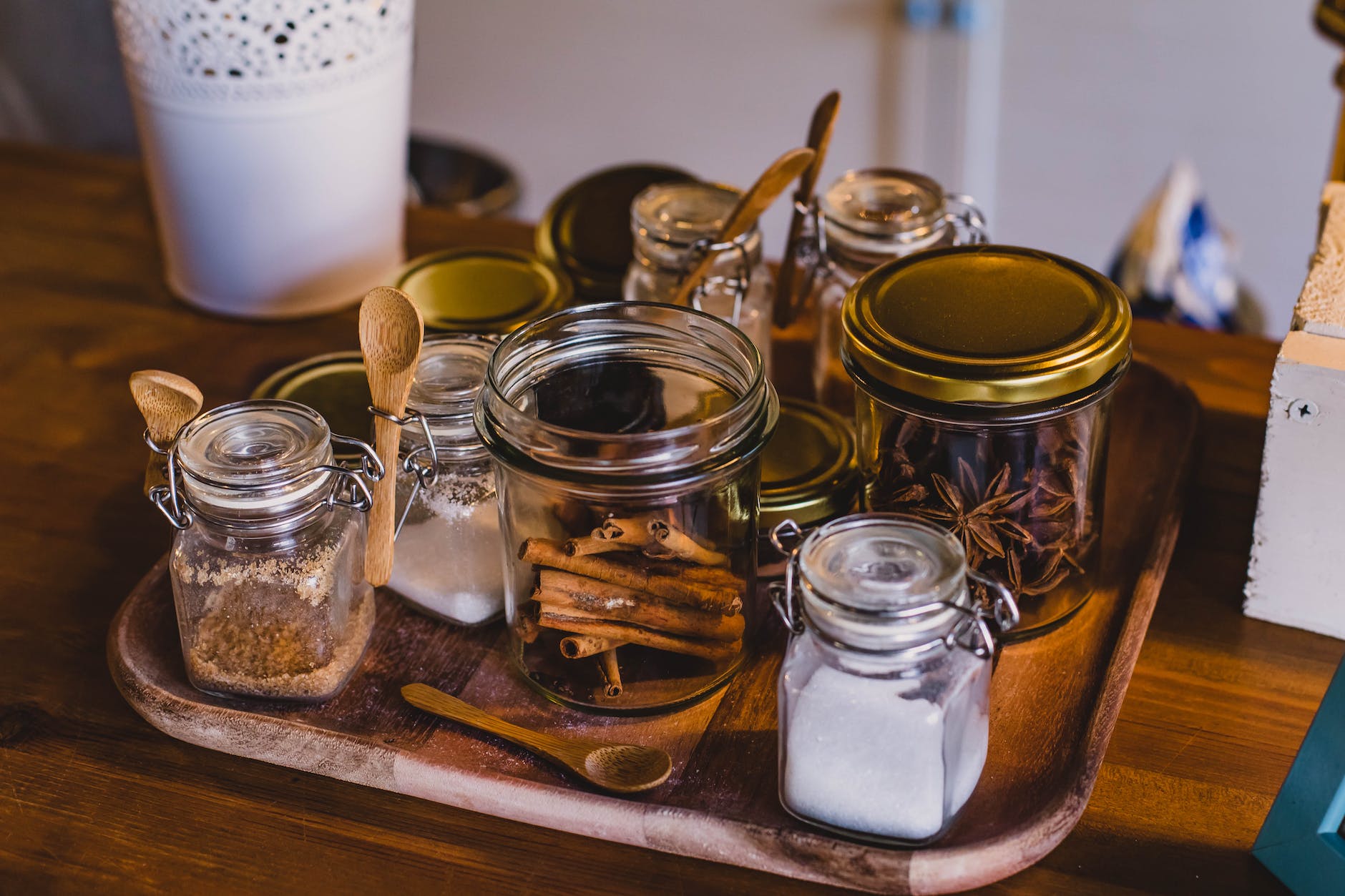 clear glass jars on top of tray