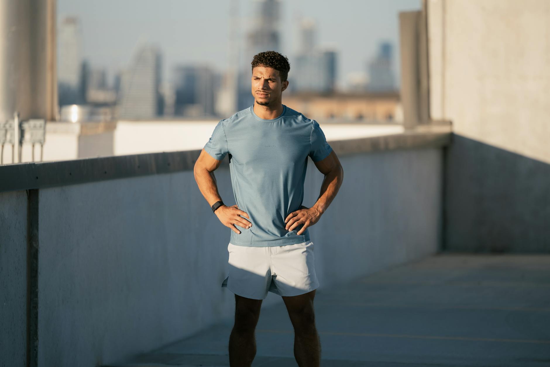 athletic man exercising on austin rooftop