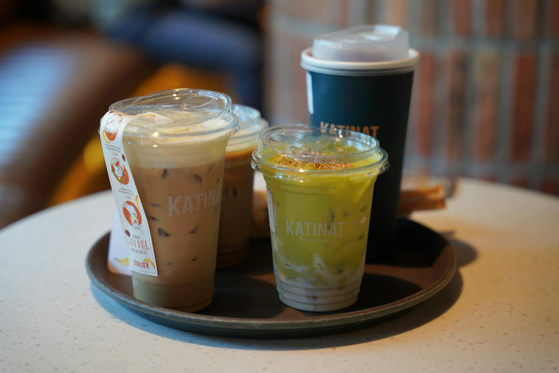 assorted iced drinks on cafe table
