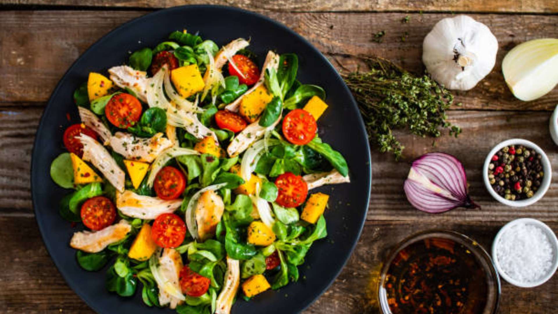 Chicken & Butternut Squash Salad with vibrant vegetables and fresh greens.