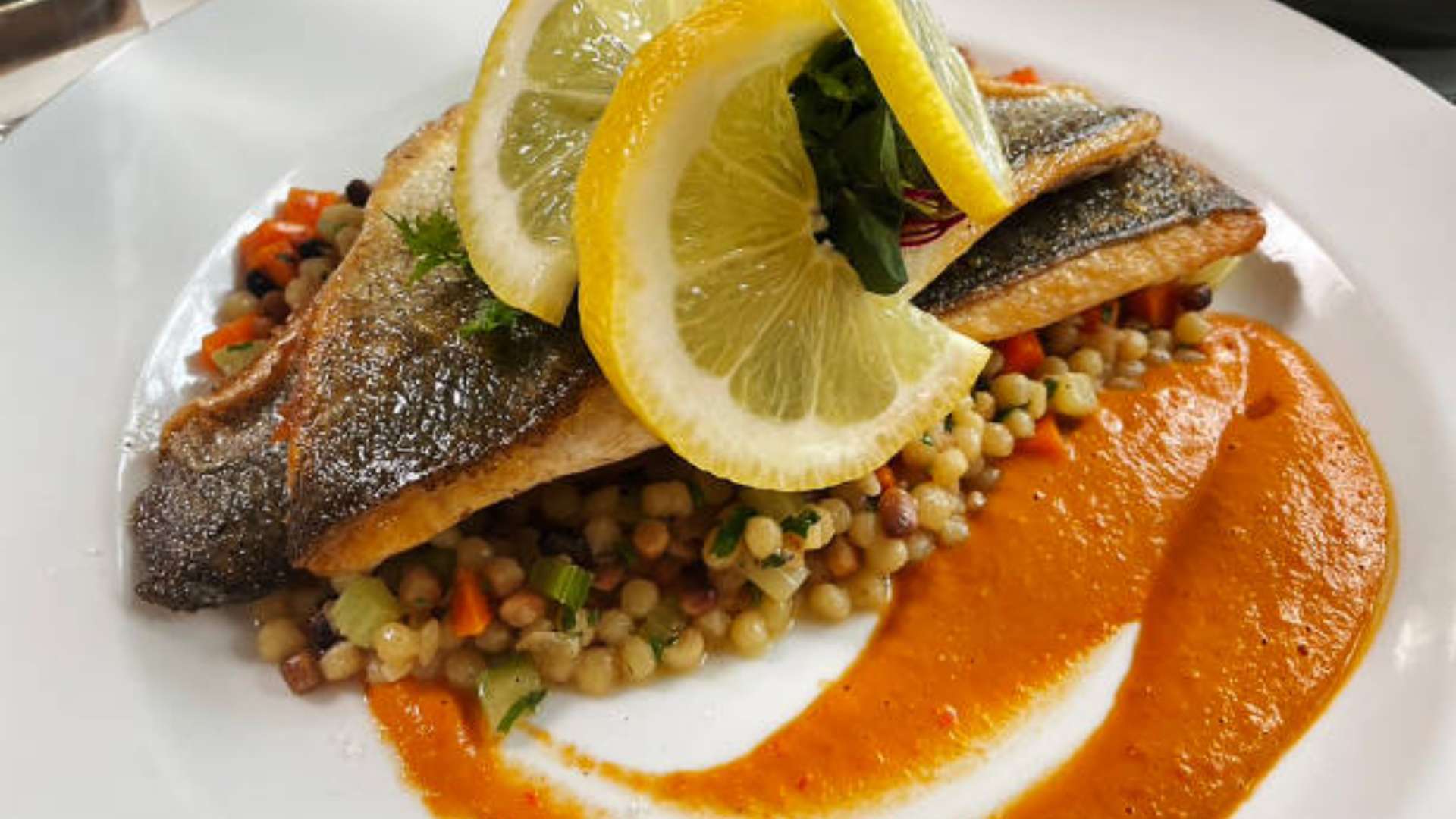 Rainbow Trout served with a vibrant Mango Chutney topping for a flavorful and healthy dish.