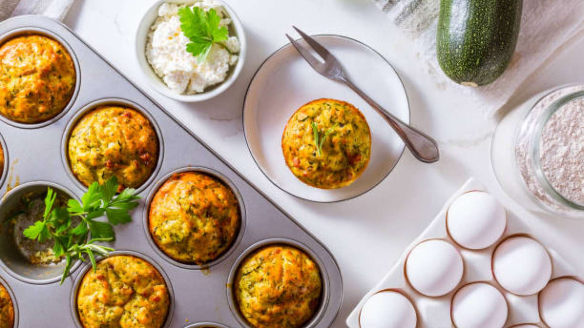 Close-up of freshly baked Veggie-Packed Egg White Muffins with Kabocha squash and Brussels sprouts.