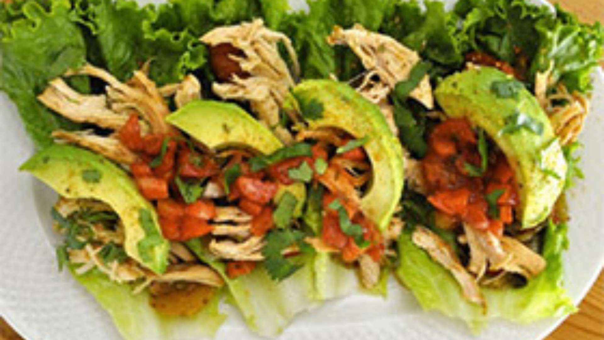 Slow cooker chicken tacos served with fresh toppings for an easy, delicious meal.