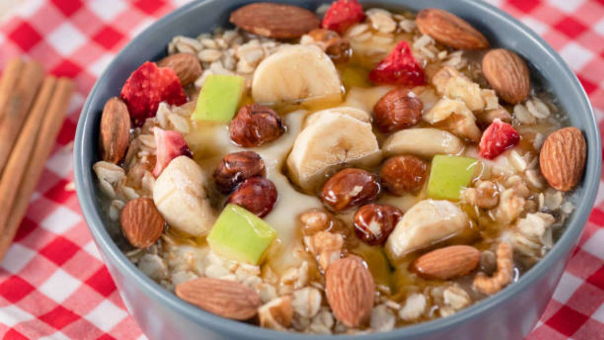Protein Power Oatmeal with pecans and banana slices, a healthy breakfast bowl.